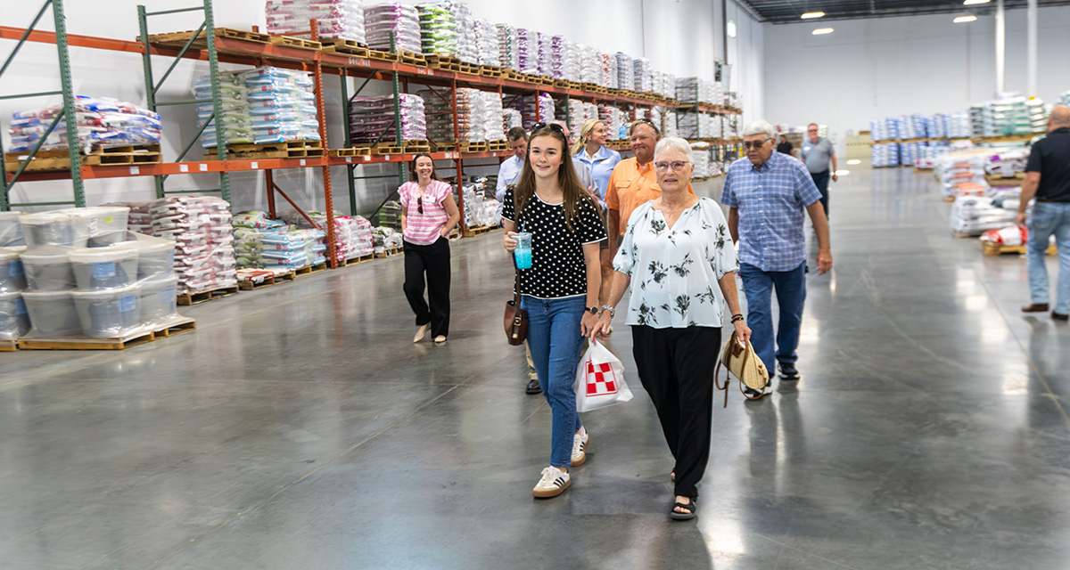 guests walking through the warehouse